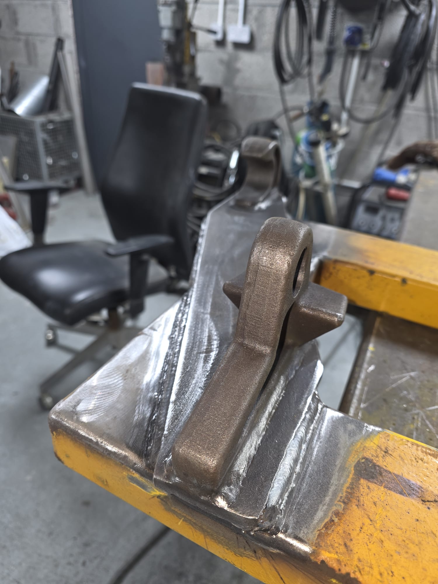 Cast bracket on beam