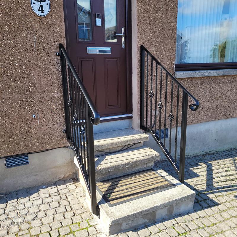 Front-step railings installed